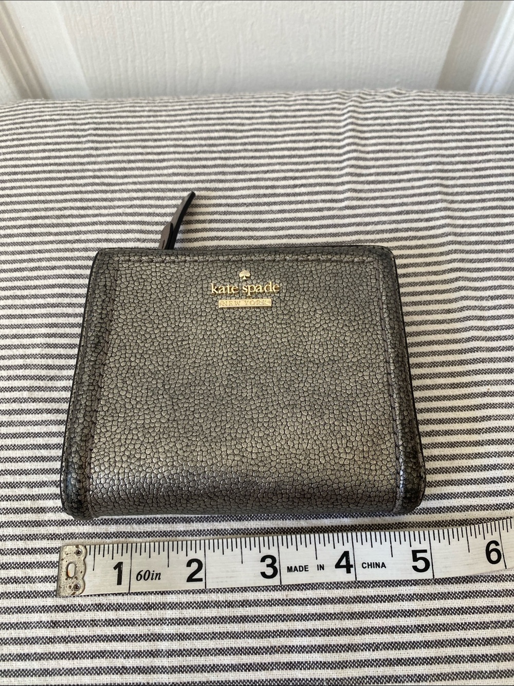 kate spade Pewter Metallic Pebbled Leather Zip Bifold Wallet